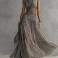 Top Grigio Trasparente con Pannelli in Pizzo e Gonna Maxi Plissettata