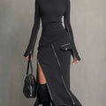 Set con tasche e zip irregolari a collo alto