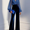 Tuta in velluto blu con scollo a V e maniche lunghe