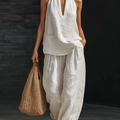 Set Top Senza Maniche a V in Lino Finto Bianco e Pantaloni a Gamba Larga